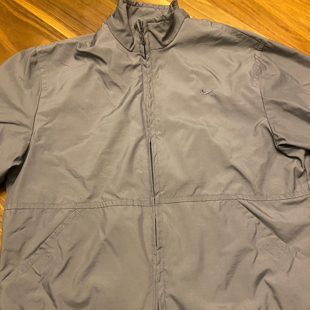 Nike womens jacket. Size medium. Color grey.